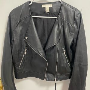 Pre-worn faux leather jacket.